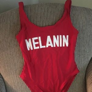 Red melanin one piece bathing suit